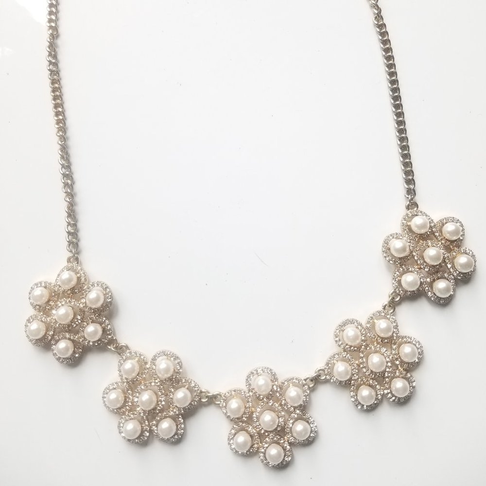 Imitation pearl in rhinestone halo cluster and gold-tone statement necklace
